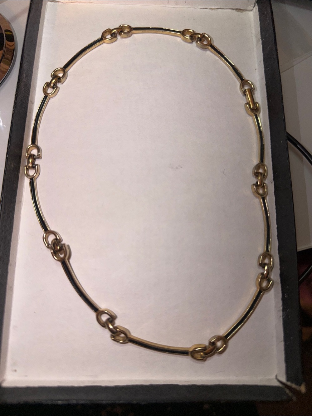 Sarah Coventry REVERSIBLE 1 side all gold color other side is black with gold.